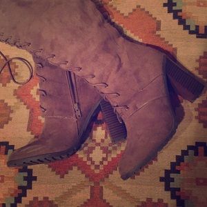 High heeled lace up suede boots
